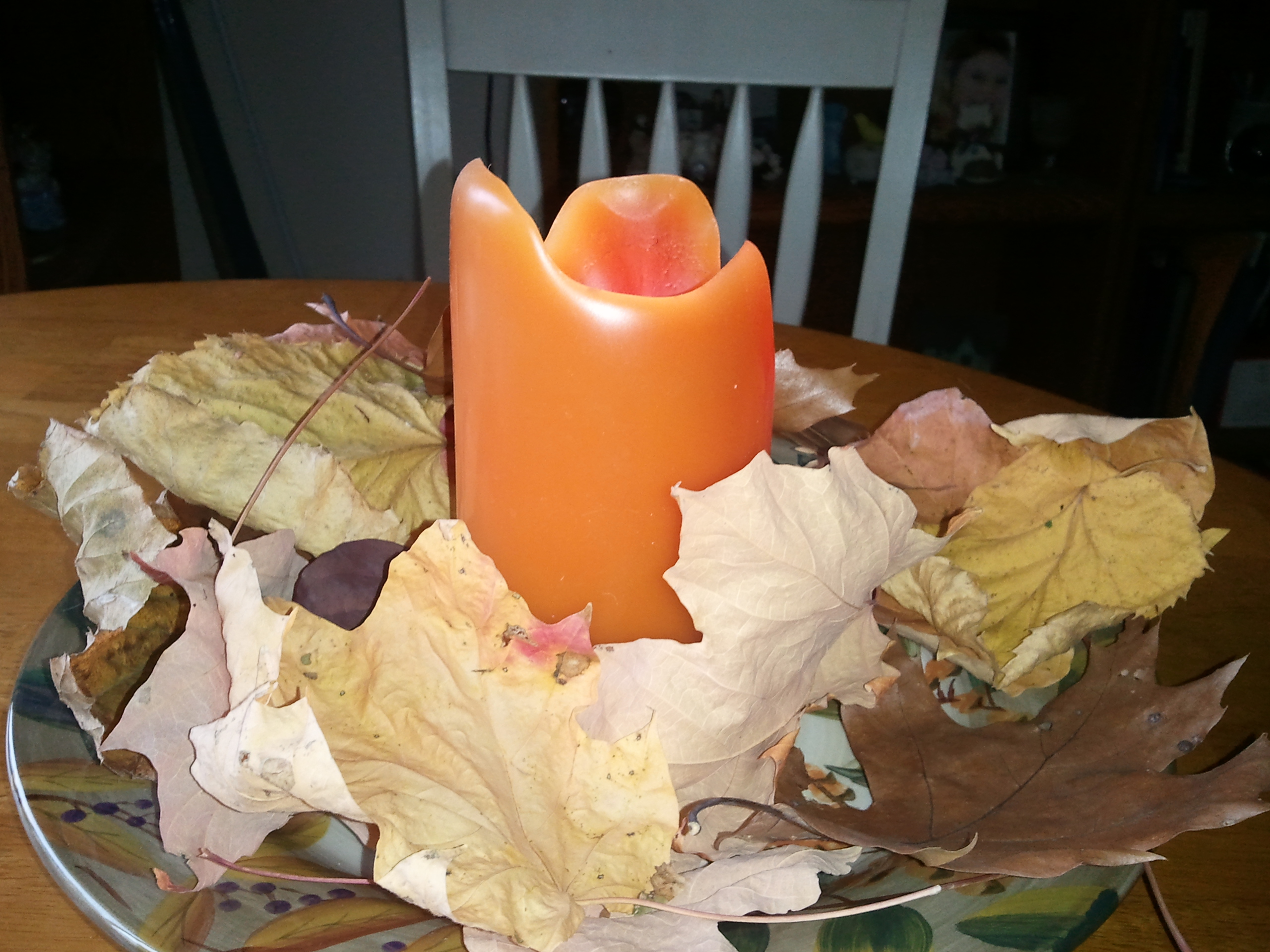 fall leaves with candle